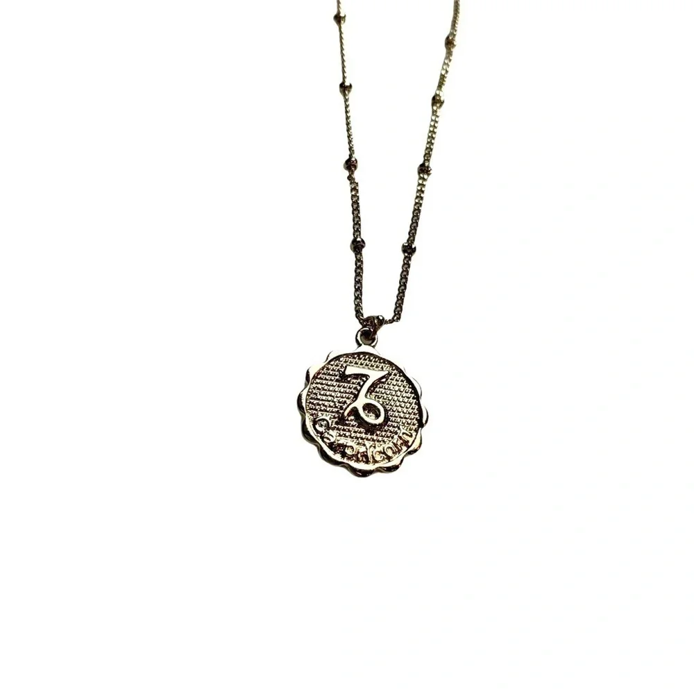 Gold Tone Capricorn Zodiac Short Length Necklace